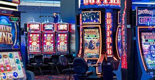 Filipino player browsing phtya game lobby on mobile phone with live casino and slots visible